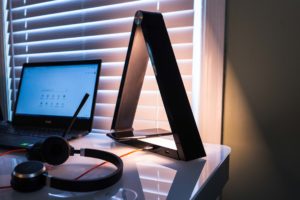 Black triangular desk lamp